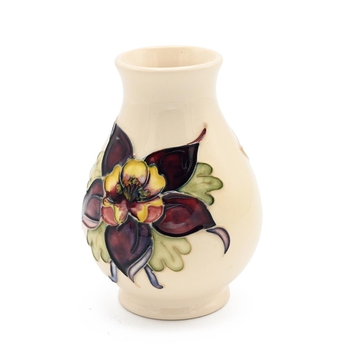 245 - Moorcroft Columbine pattern posy vase - mid 20th century. Height 10cm, diameter 6cm.