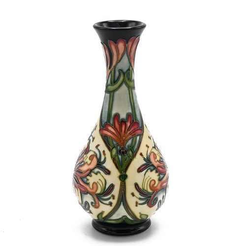 249 - Moorcroft Florian Dream bottle vase by Rachel Bishop, 2005. Height 17cm, diameter 8cm.