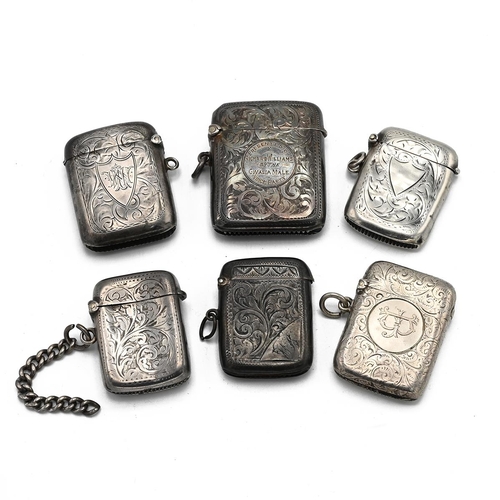 25 - A collection of 6 Victorian and later silver engraved vesta cases, 129 grams 