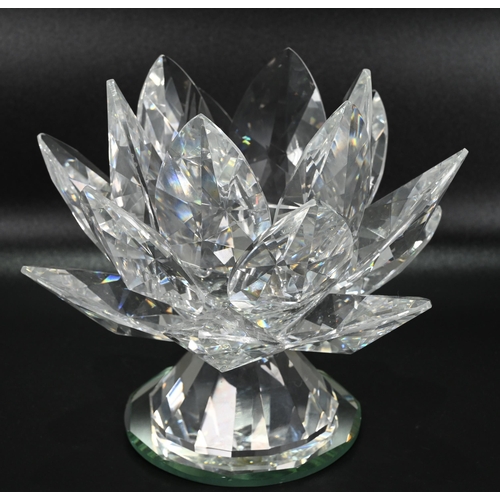 273 - Glassware to include a collection of Swarovski glass comprising: A large (12cm) Waterlily candle hol... 