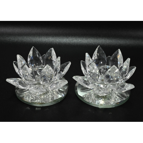 273 - Glassware to include a collection of Swarovski glass comprising: A large (12cm) Waterlily candle hol... 