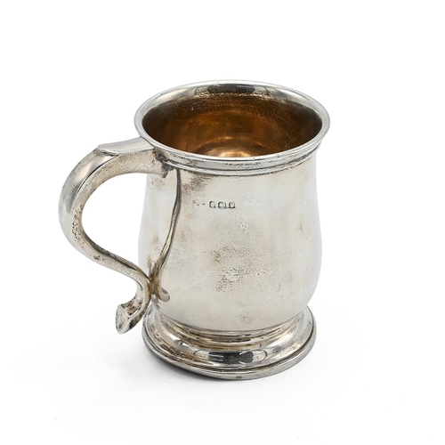 28 - George V silver tankard of baluster form, Birmingham 1926, makers marks rubbed, 10cm high, 254 grams... 