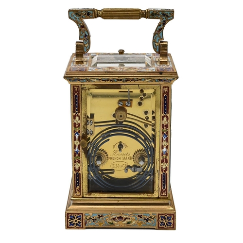 305 - A Late 19th Century French eight day, two train, repeating carriage clock in gilded brass and Champl... 