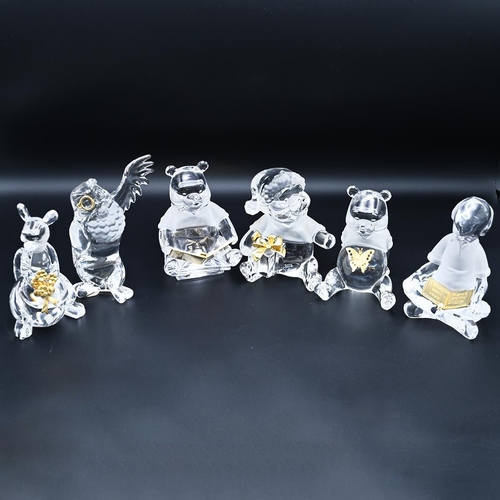 340 - A collection of 16 Lennox Disney glass models of Winnie the Pooh, along with Bradford Exchange model... 