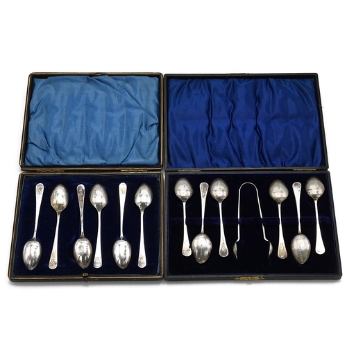 35 - A silver set of matching teaspoons and matching sugar nips, along with a set of silver teaspoons and... 