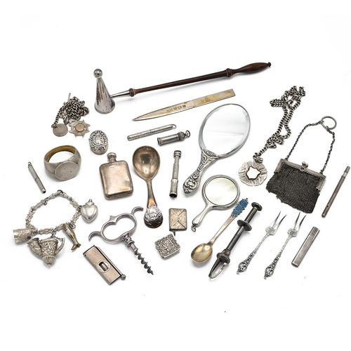 38 - A collection of miscellaneous silver items to include miniature hand mirrors, letter opener, napkin ... 