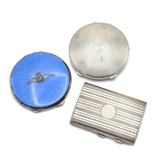 41 - A silver and guilloche enamel R.A.F compact along with another silver compact and a silver case 
