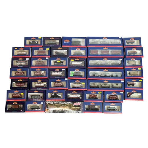 413 - Quantity of boxed Bachmann toy Model Railway 00 gauge wagons. All LMS colours. (approx 42) 