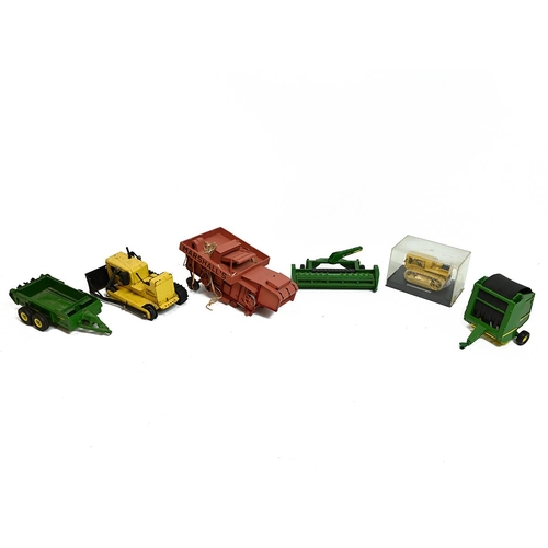 425 - Quantity of boxed and loose toy model tractors. Including Bruder, matchbox, Cat John Deere.  