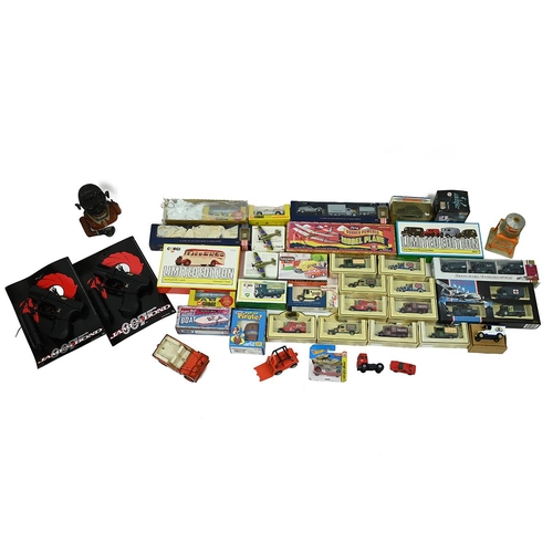 427 - Mixed box vintage toys. Including boxed and loose Corgi Cars, carded 007 James Bond guns, vintage mo... 