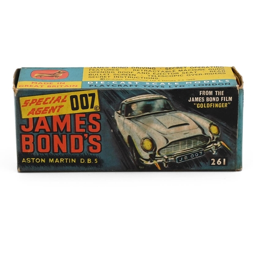 430 - Vintage Boxed Corgi Toys- James Bond Aston Martin DB5 #261 c1965. Paperwork present in base of box. 