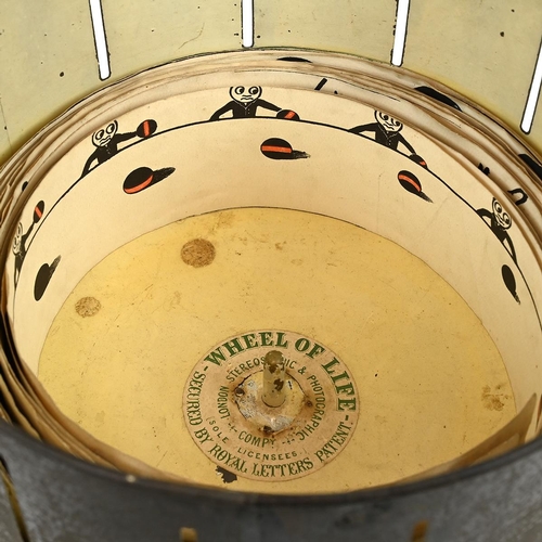 455 - Antique boxed toy Zoetrope on Walnut base with japanned metal drum. Marked 'Wheel of Life, London St... 