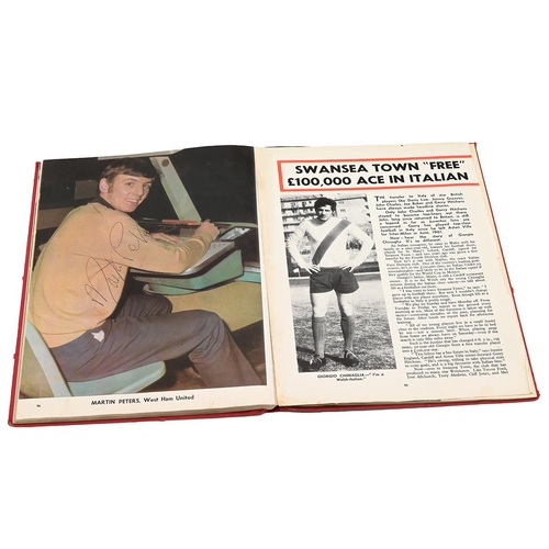 521 - A good collection of 1960's/1970 football autographs, signed in The Topical Times Football Book, 196... 