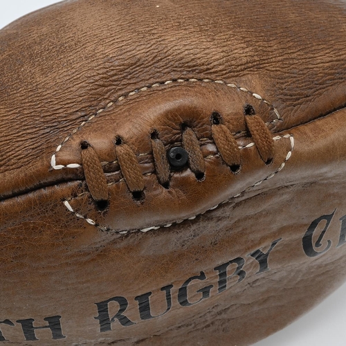 524 - A leather rugby ball, printed Bath Rugby Club