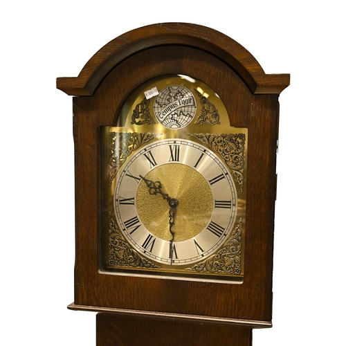 56 - An Oak longcase Grandmother clock by Pallesgaard of Copenhagen with three train movement, brass dial... 