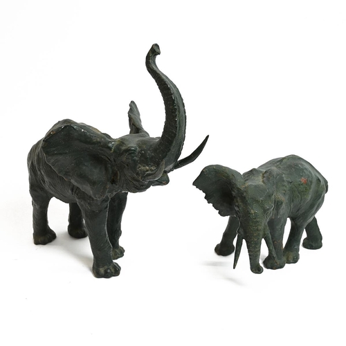 566 - 20th Century - A Mother and Baby Elephant, the mother trumpeting, cast iron with green patina, the f... 