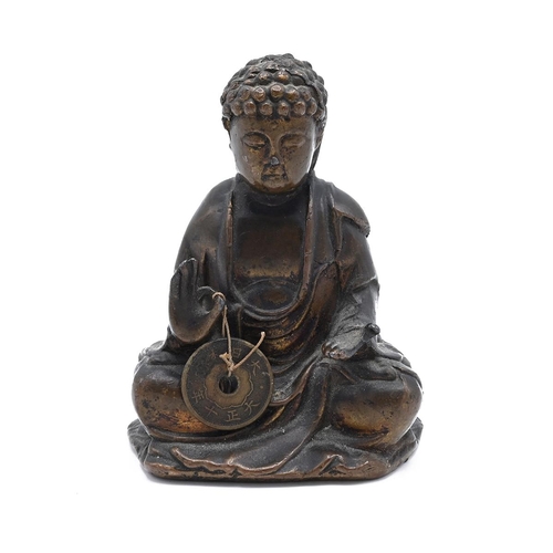 572 - A bronze Chinese Buddha holding a coin, 9cm x 6cm x 5.5cm