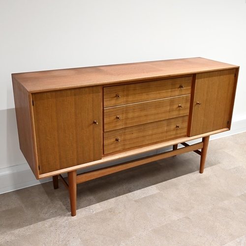 588 - A Mid-Century Gordon Russell teak sideboard with three long drawers, one with felt lined cutlery tra... 