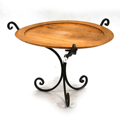 595 - A Mid Century hand wrought iron based coffee table with turned elm top c1950s. Diameter 88cm, H 59cm... 