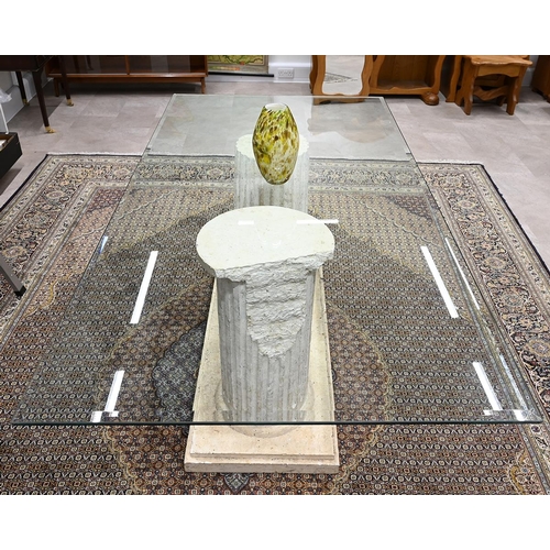 597 - Glass topped dining table supported on a heavy plaster plinth of broken Greco-Roman style columns. H... 