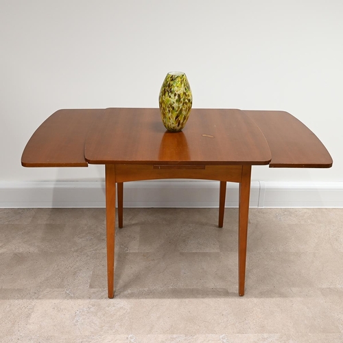 602 - Mid Century Teak dining table and four chairs. The draw-leaf extending table of rounded square form ... 