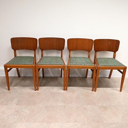 602 - Mid Century Teak dining table and four chairs. The draw-leaf extending table of rounded square form ... 