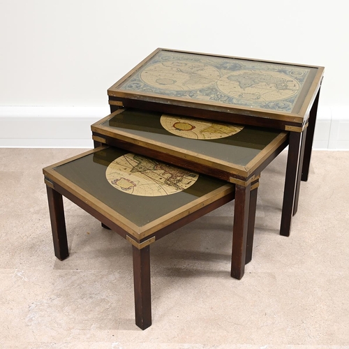 604 - Mid Century Campaign style nest of three map tables, mahogany frame, brass bound, glass tops over an... 