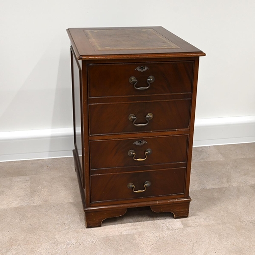 620 - Mahogany 2 drawer filing cabinet with tooled brown leather insert to top. The drawer fronts designed... 