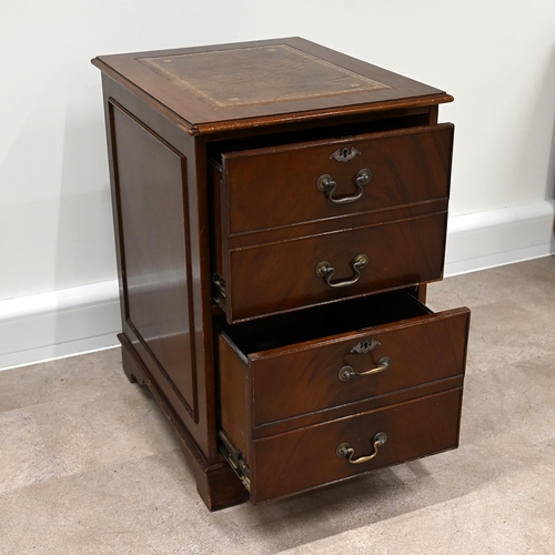 620 - Mahogany 2 drawer filing cabinet with tooled brown leather insert to top. The drawer fronts designed... 