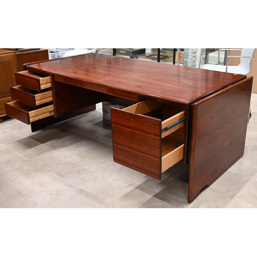 625 - A Dyrlund Skyline Danish rosewood executive desk, circa 1970's, with three drawers and a file drawer... 