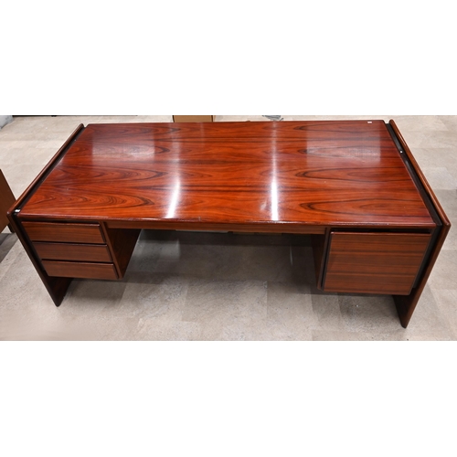 625 - A Dyrlund Skyline Danish rosewood executive desk, circa 1970's, with three drawers and a file drawer... 