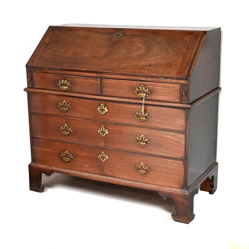 626 - A Georgian Mahogany Bureau of good proportions with original brass hardware. Internally it has a hid... 