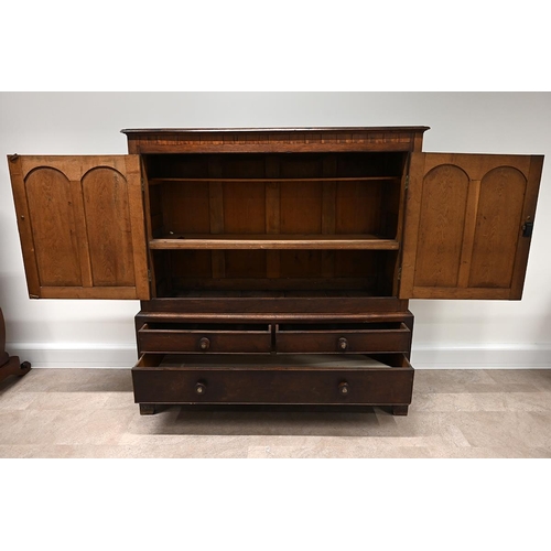 630 - 19th Century Oak Linen Press Cupboard comprising two doors, flanked by turned and facetted columns, ... 