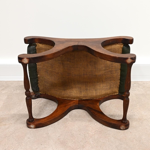 633 - A Saddle style footstool, in the manner of Chesterfield, with buttoned green leather top and mahogan... 