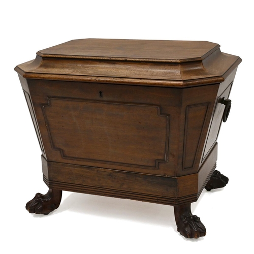 639 - A Regency (circa 1820) mahogany wine cooler. Of sarcophagus shape with brass laurel wreath ring hand... 