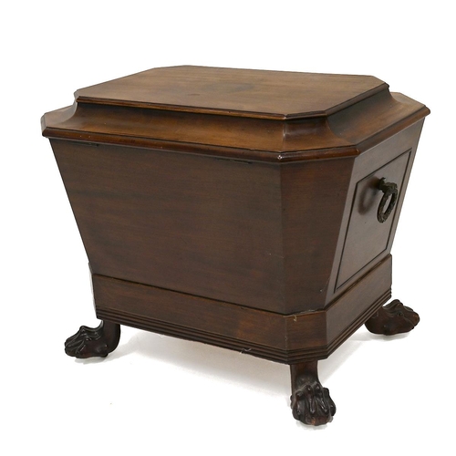 639 - A Regency (circa 1820) mahogany wine cooler. Of sarcophagus shape with brass laurel wreath ring hand... 