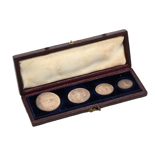 65 - 1860 silver four-coin Queen Victoria Maundy Money set in a contemporary long box with hook closure. ... 