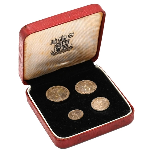 69 - 1928 King George V silver Maundy Money four-coin set in the original red box with gold lettering to ... 