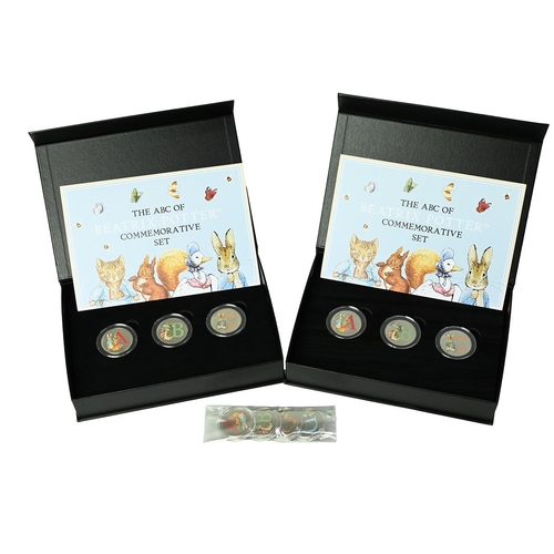 84 - Group of three (3) A-Z Beatrix Potter Peter Rabbit commemorative cupronickel sets from Westminster M... 