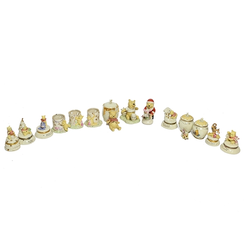 337 - A large collection of Disney Lennox Winnie the Pooh ceramics to include cookies jars, Christmas mode... 