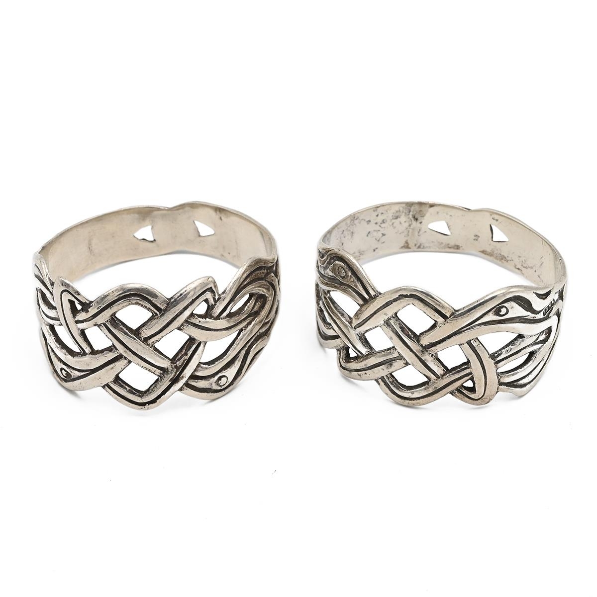 A pair of Iona silver Arts & Crafts napkin rings, in the Celtic style ...