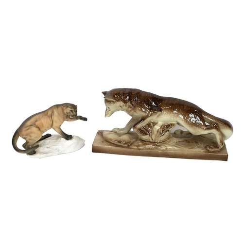 104 - Beswick large bisque glaze figurine of a Cougar in aggressive pose on a white rock (model 1702) heig... 