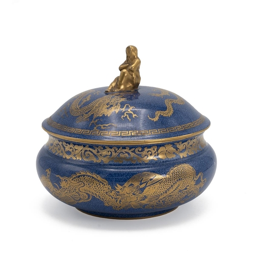 121 - Daisy Makeig Jones for Wedgwood Dragon Lustre powder bowl with cover in blue and gold, with Sibyl fi... 