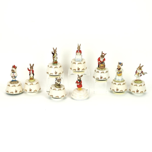 122 - Nine Bunnykins music boxes playing tunes to include Rock-a-by-Baby (two models, one with red jacket,... 