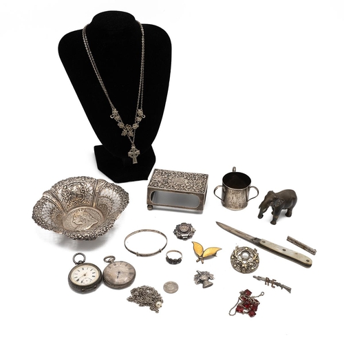 15 - A collection of miscellaneous silver items to include a Victorian silver basket with a portrait of Q... 