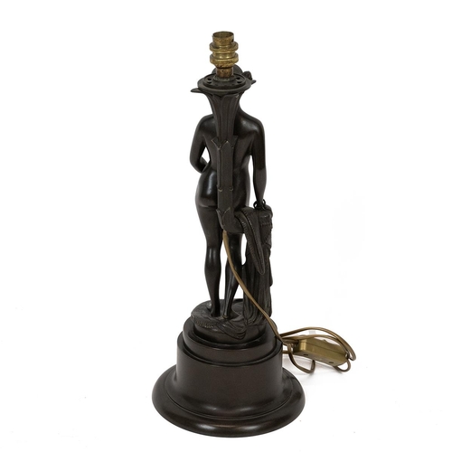 36 - Art Deco bronze table lamp in the form of a nude leaning on a palm. Height 46cm excluding bulb holde... 