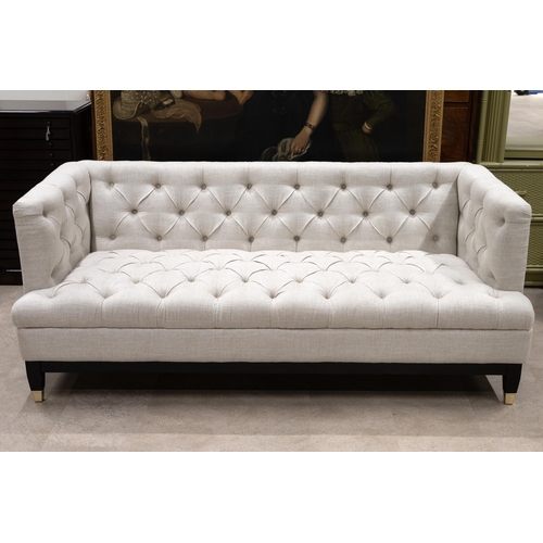 403 - Contemporary two seat box sofa. Upholstered in cream linen with button back detailing. W 188cm, D 88... 