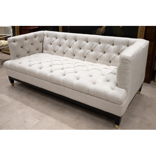 403 - Contemporary two seat box sofa. Upholstered in cream linen with button back detailing. W 188cm, D 88... 