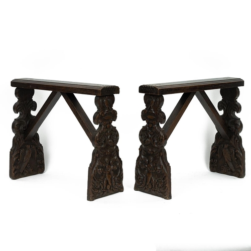 404 - Pair of oak Dutch 19th Century cabinet / 'coffin' stands. Carved front and rear supports with figure... 