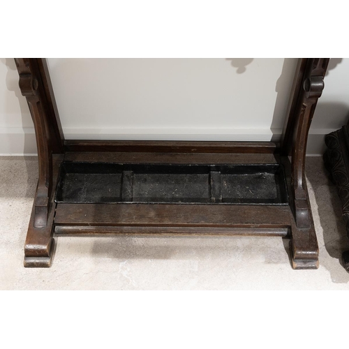 408 - 19th century Gothic Revival hall stand. Walnut construction with inset mirror, metal drip tray to ba... 